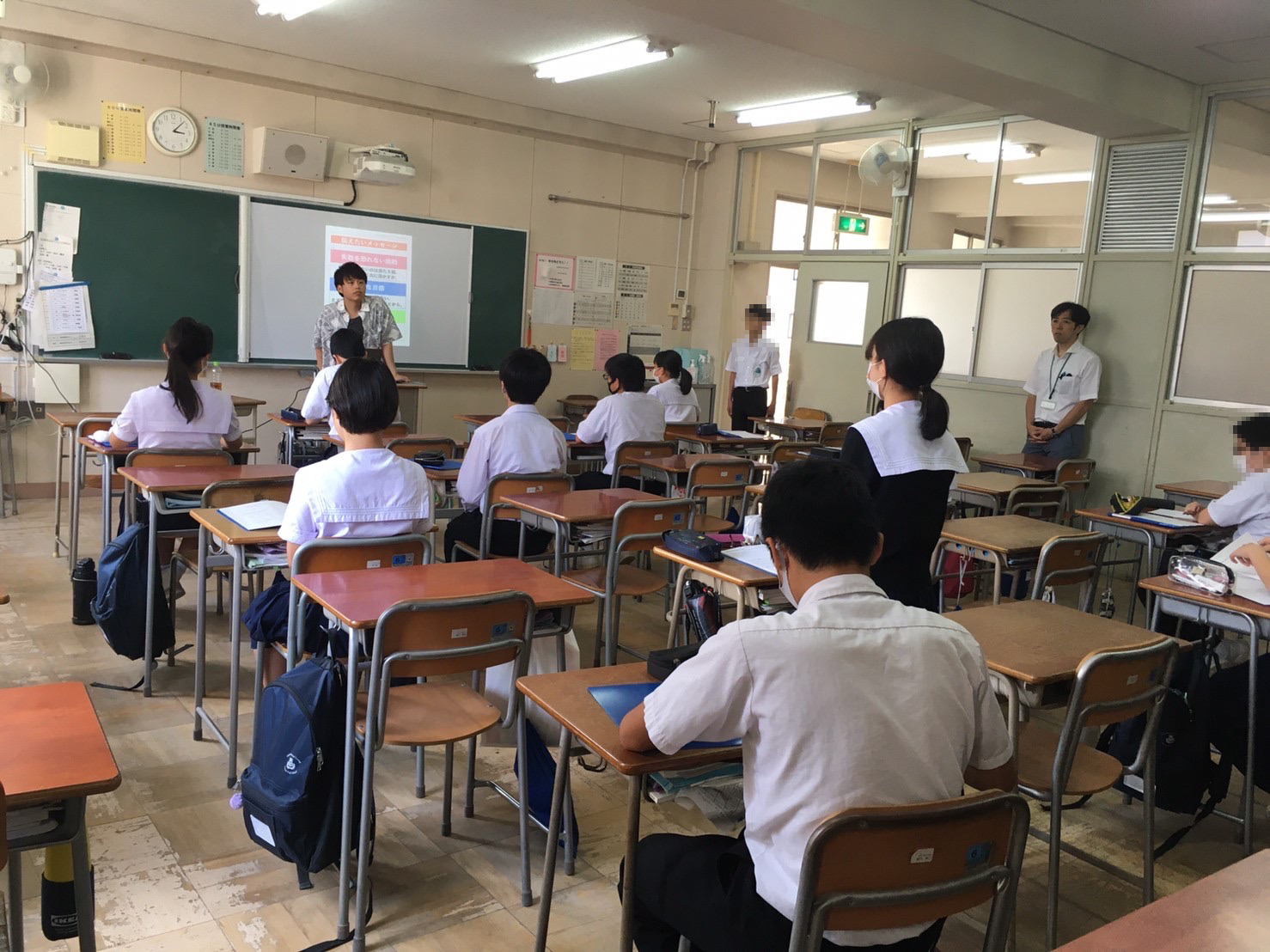 代表の福永が天王寺中学校で講演